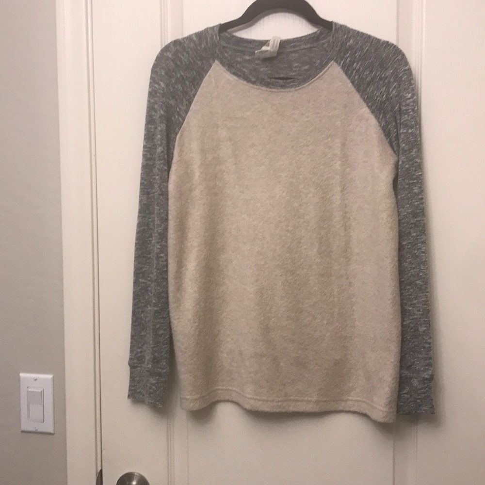 Long sleeve tan and gray top.